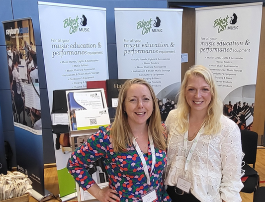 The Black Cat Music team on the stand at MTA Conference 2025 at Trinity Academy Bristol