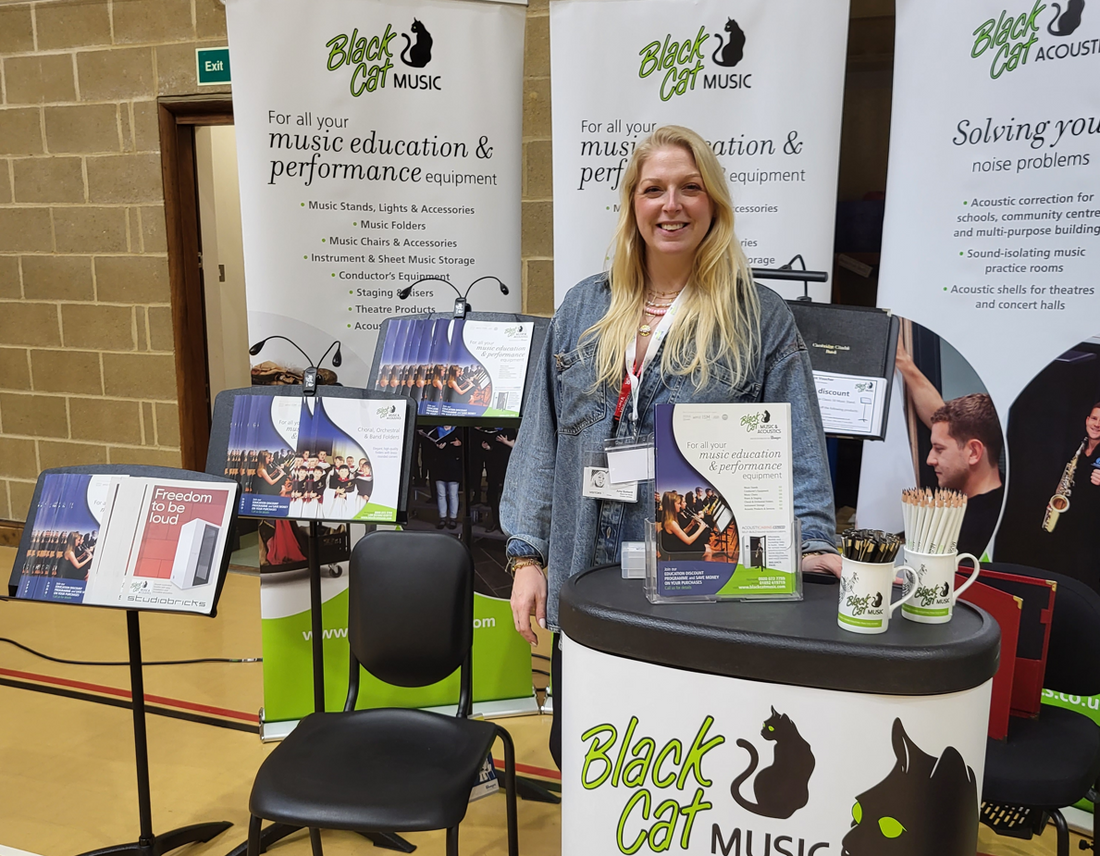 Amy on the Black Cat Music exhibition stand