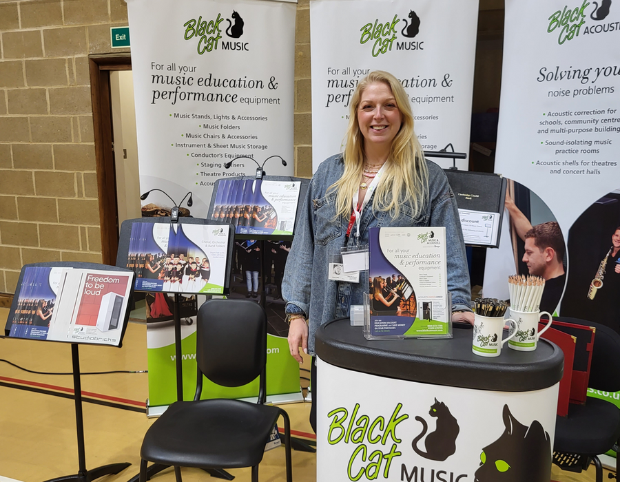 Amy on the Black Cat Music exhibition stand